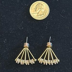 Diamonique earrings in golden tone.